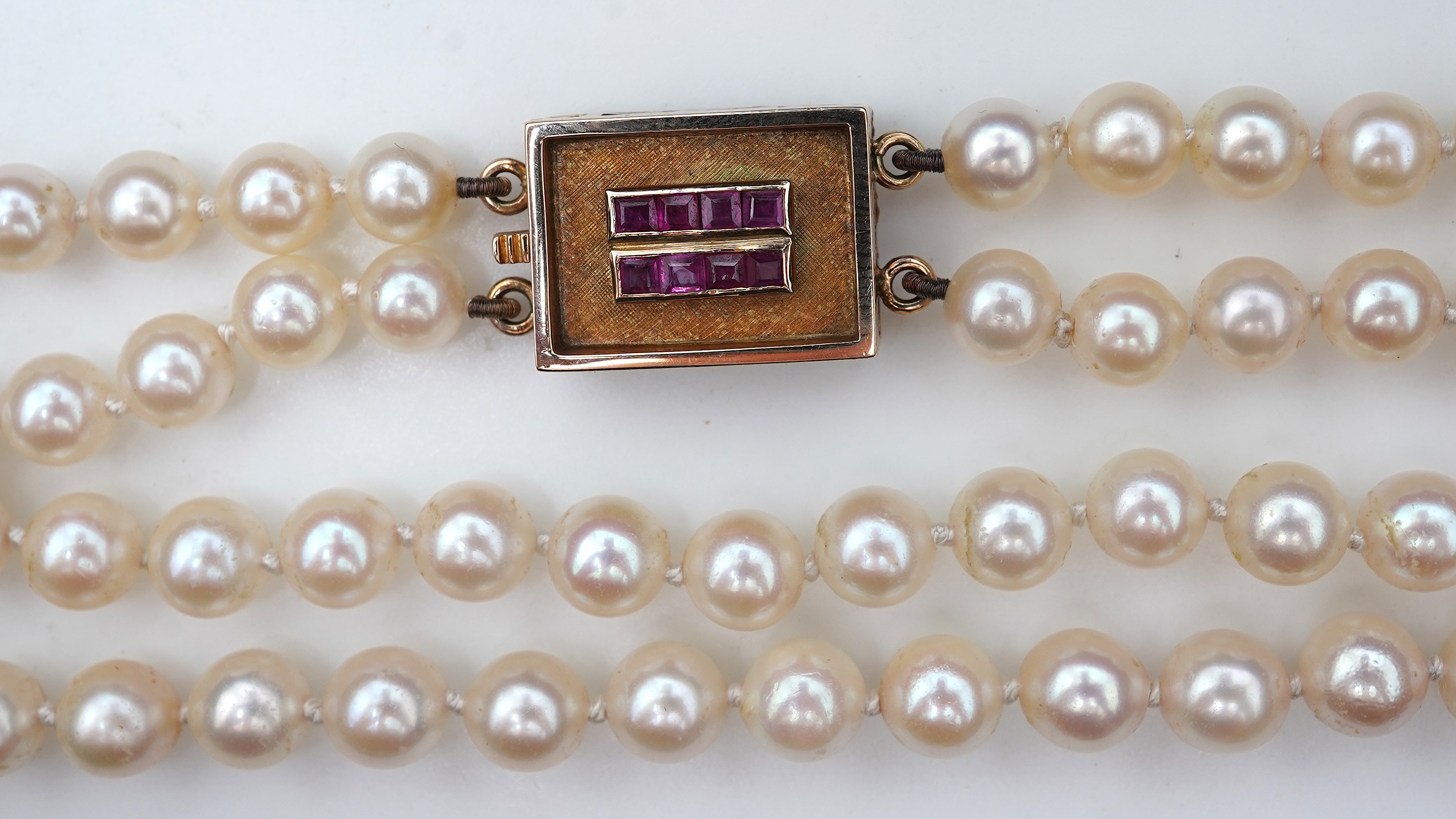 A cultured pearl and ruby necklace